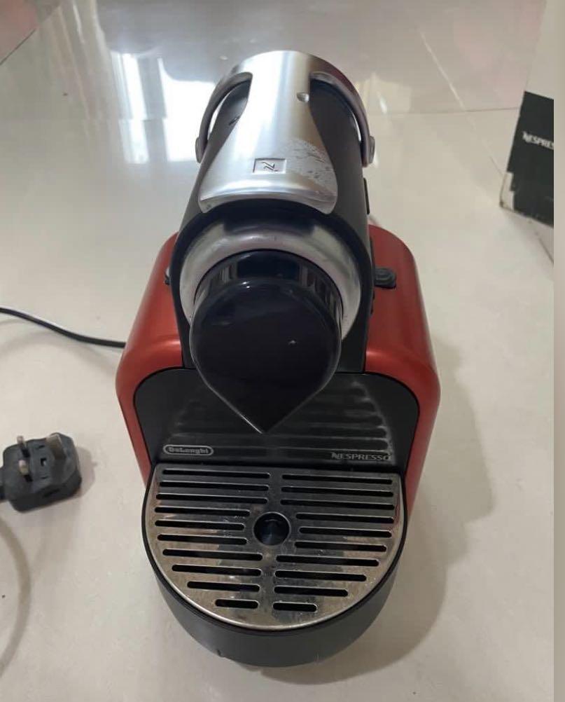 Nespresso x Delonghi Essenza Automatic Coffee Machine (Category: Coffee Machines & Makers) located in Manila. Submitted by shopwithbrilliantadel (Listing ID 1174953779, Image 3). Description: works perfectly fine rarely used regularly descaled no issue except for scratches due to usage.