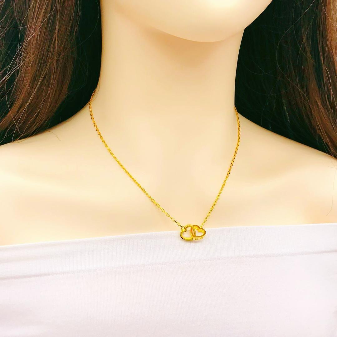 Gold interlocking heart necklace online