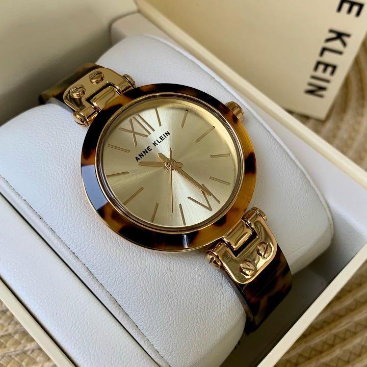 Anne Klein Women s Gold Tone and Tortoise Brown Resin Bracelet Watch