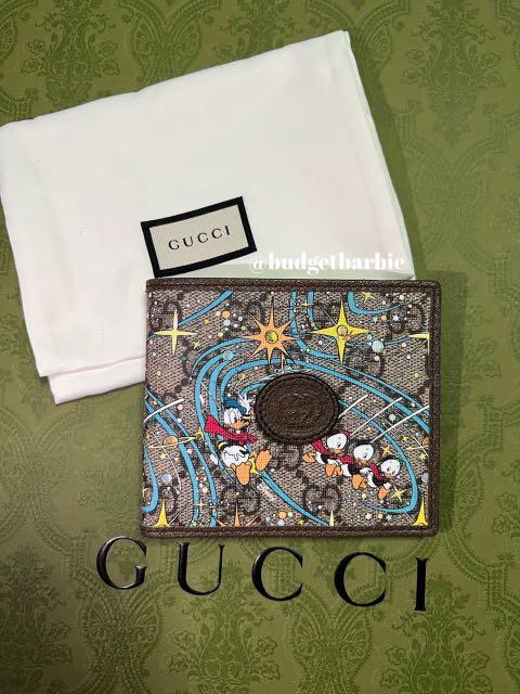 Gucci wallet donald on sale duck