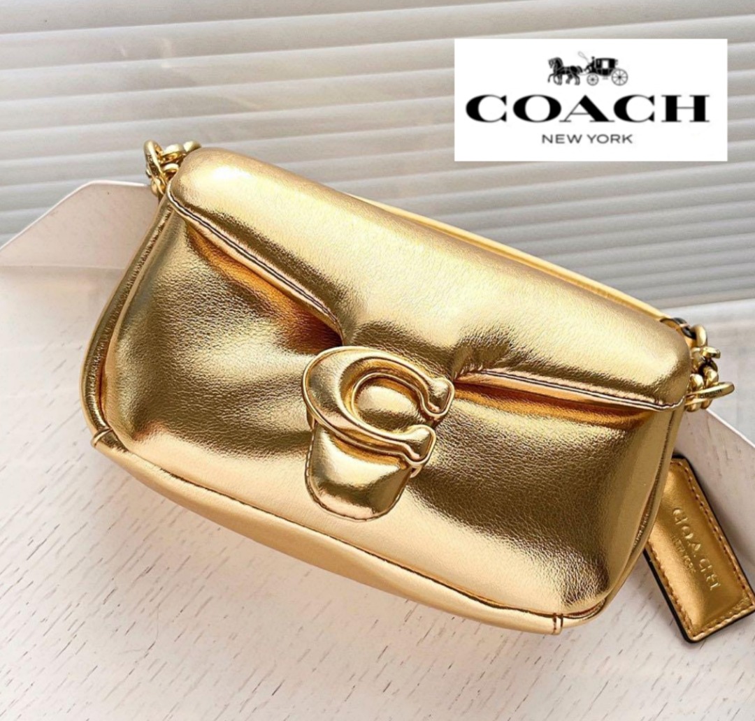 Coach gold clutch online