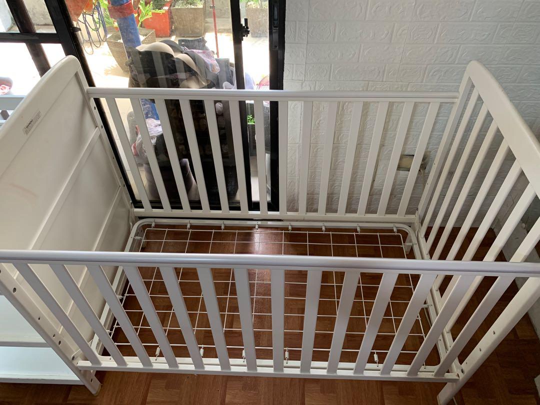 2 in 1 ADJUSTABLE WOODEN CRIB (WHITE) (Category: Cots & Cribs) located in Marilao. Submitted by gorjuzshop (Listing ID 1175125052, Image 2). Description: PRELOVED wooden crib with 3 layer shelves! well used. crib is 10/10 ISSUE: shelf on first layer is loss thread po, you can see sa 3rd picture but you can have it repair. yun lang nman ang need for basic fixes. di na naasikaso ayusin dhil hindi nman na gngamit ni baby. mas gusto na tumabi sakin. 