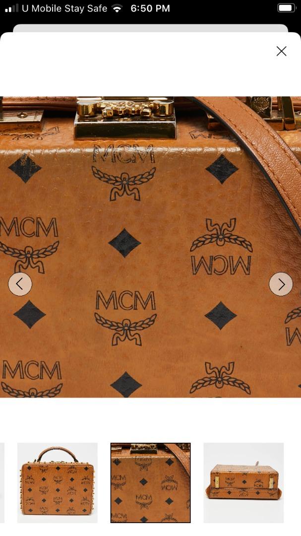 Sold at Auction: MCM Cognac Visetos Coated Canvas Barrel Bag, with