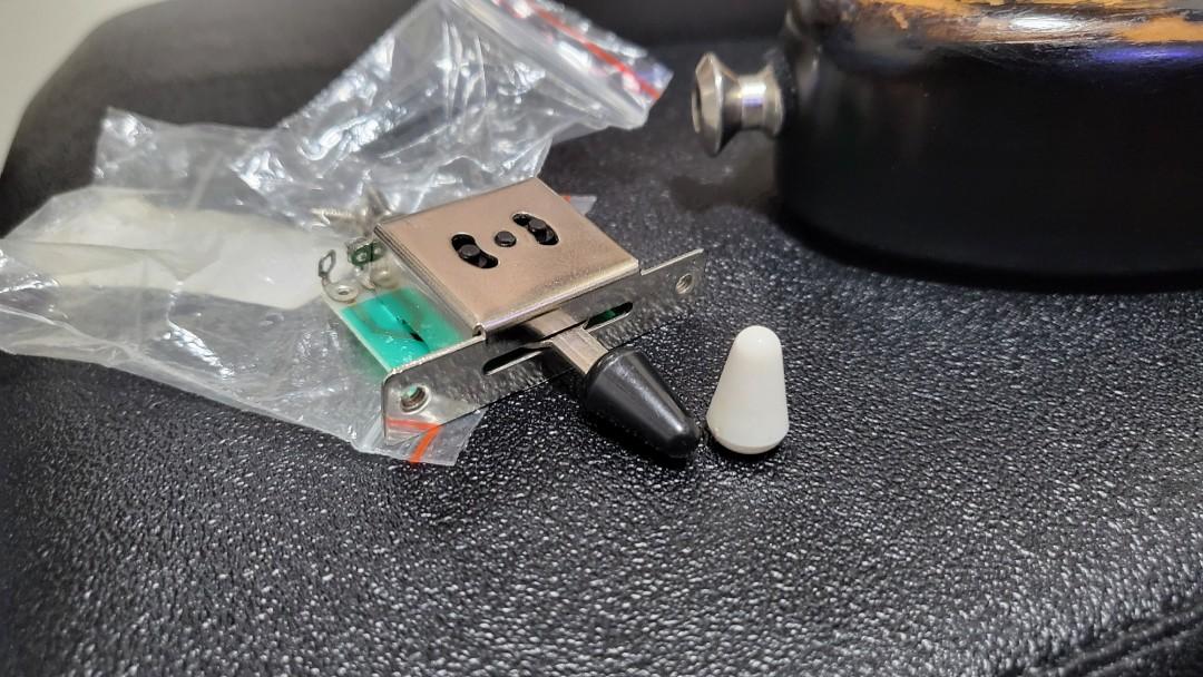 Extra Guitar parts, capacitors, screw mounts, mini toggle switch