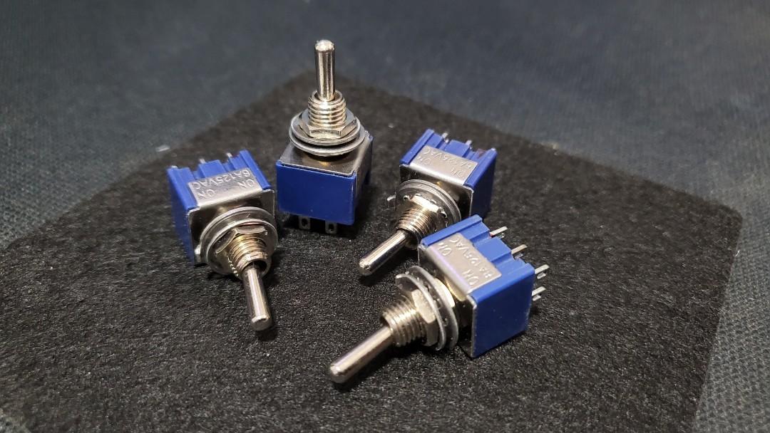 Extra Guitar parts, capacitors, screw mounts, mini toggle switch