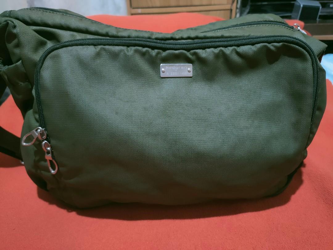 Hedgren Authentic Laptop/ Messenger/Sling Bag Rare (Category: Sling Bags) located in Quezon City. Submitted by jhaneth21 (Listing ID 1175319069, Image 3). Description: 2 Main Zip Compartments Back Compartment 2 Side Pockets With Tags, Logos Heavy Duty Hedgren Zippers Metal Tags with Serial No. Heavy Duty Strap with Padding Size: 16" x 10" x 4.5".