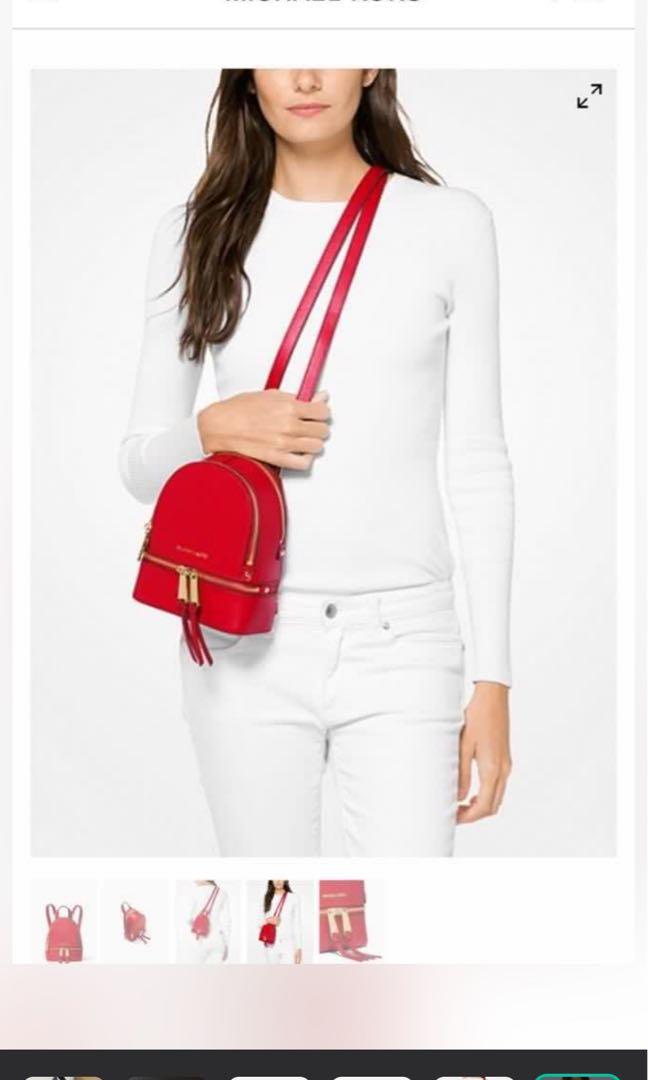Michael Kors Rhea Zip (Category: Backpacks) located in Manila. Submitted by fatsa (Listing ID 1175448734, Image 1). Description: Michael Kors Rhea Zip XS Msgr backpack Red with gold hardware With dustbag Used once - no issues Rfs: Decluttering 8,000 For Lalamove / Grab / Mr. Speedy pick up. c/o the buyer.