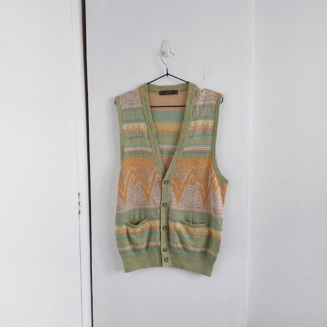 V-neck Green Sweater Vest (Category: Coats, Jackets and Outerwear) located in Angeles City. Submitted by greensstuff (Listing ID 1175283008, Image 1). Description: Has some loose threads as seen in pictures 5 and 6. DM for more info and sizing/measurements 😊.