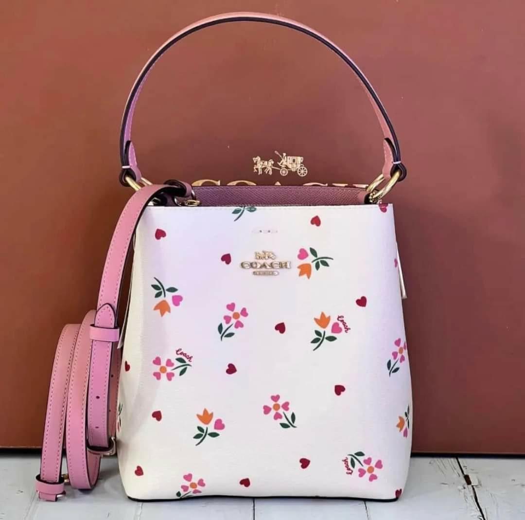 Shop Coach 2022 Cruise Small Town Bucket Bag With Heart Petal Print (C7976)  by Ocealani