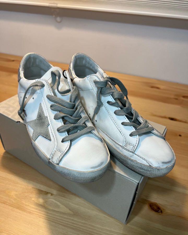 Golden Goose Women s Super Star sneakers with silver heel tab and metal stud lettering