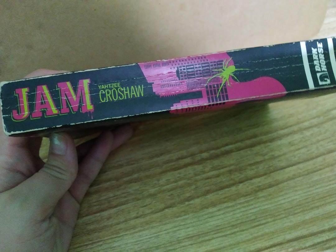 Jam by Yahtzee Croshaw (Paperback) (Category: Storybooks) located in Bacoor. Submitted by IchibaNeko_Finds (Listing ID 1170465721, Image 2). Description: Have you ever dealt with a man-eating jam? If you want to know, this is the perfect book for you 👍 Genre: Sci-fi Horror Comedy Publisher: Dark Horse 🛑PLEASE READ🛑 ✔️Good Condition ✔️Pages are intact ✔️Items are available as long as it's not tagged as reserved/sold RFS:DECLUTTERING 🔍These are