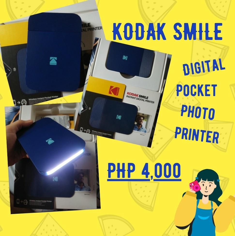 KODAK SMILE Digital Pocket Photo Printer (Category: Other Gadgets) located in Caloocan City. Submitted by chichisprelovedclothes (Listing ID 1170377530, Image 1). Description: Only used once when I tested it. Please NO HAGGLING. 99% BRAND NEW Box were opened and tested KODAK SMILE PORTABLE PHOTO PRINTER KODAK SMILE instant digital printer connects to the free easy to use Kodak smile app that comes packed with editing features, filters, and augmen