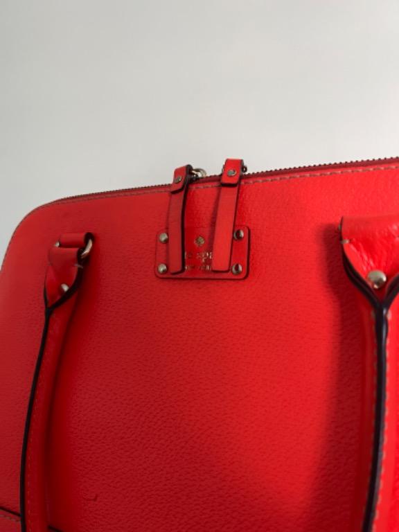 Orange Kate Spade Bag (Category: Luxury Bags & Wallets) located in Quezon City. Submitted by goldenfinds.ph (Listing ID 1170325612, Image 2). Description: Neon Orange Kate Spade Bag for sale! ₱4,500 (negotiable) - bought from the States - good condition - with dust bag - PM for measurements.