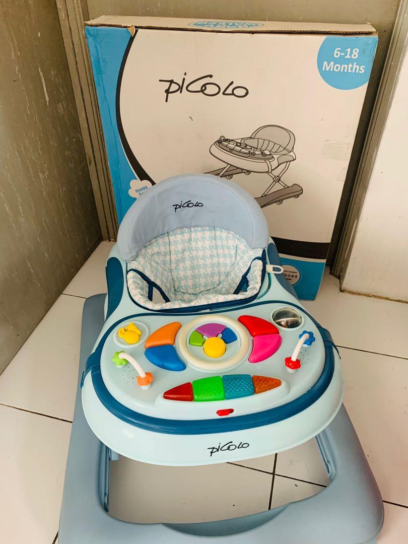 Picolo baby walker (Category: Infant Playtime) located in Quezon City. Submitted by Helpmedeclutter (Listing ID 1170333286, Image 1). Description: Complete all working no issue.