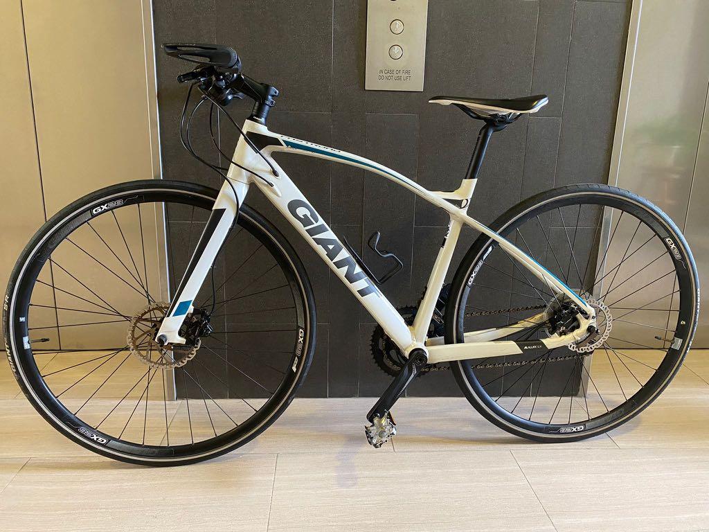 Giant fastroad slr 1 outlet 2017 hybrid bike black