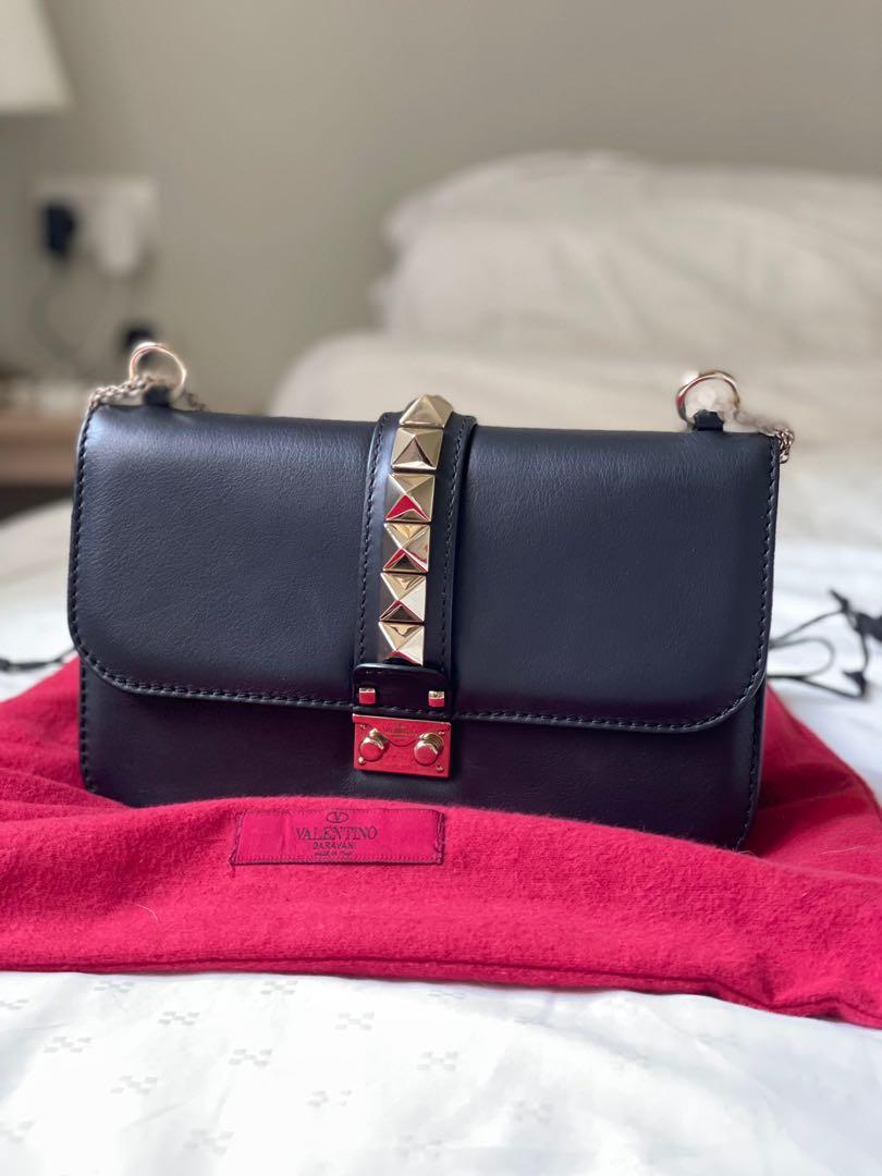 Valentino Rockstud bag black with champagne gold hardware Women s