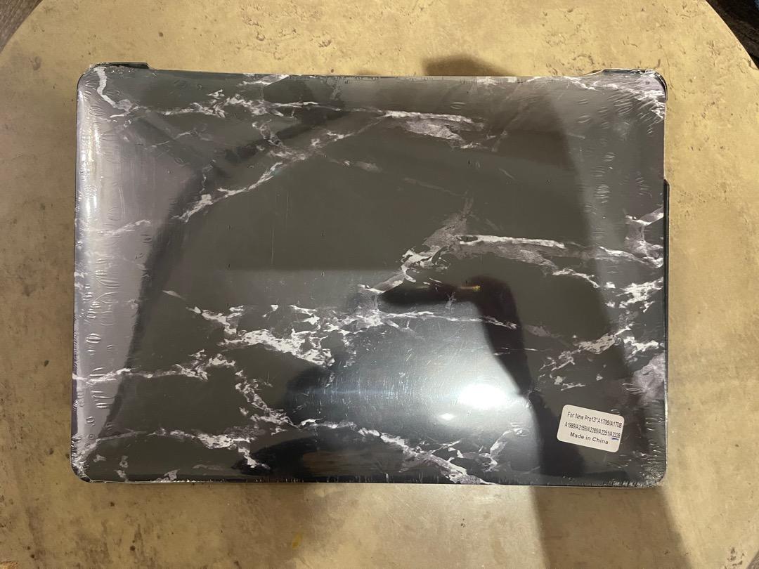 Candy Shield Macbook Pro 2020 M1 (13-inch) Marble Hard Case (Category: Other Accessories) located in Paranaque City. Submitted by rvp16 (Listing ID 1175474354, Image 2). Description: Original Price: P750 RFS: never used.