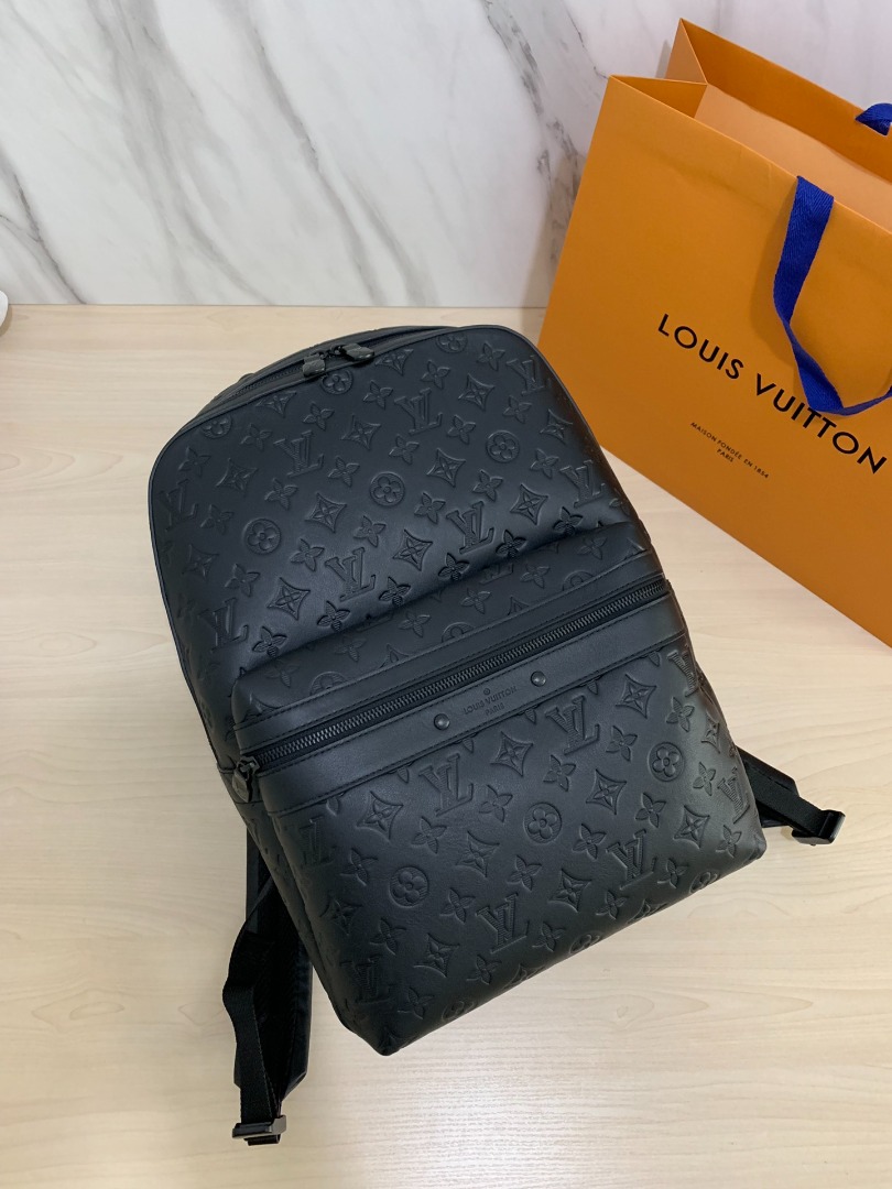 Louis vuitton embossed backpack 2025