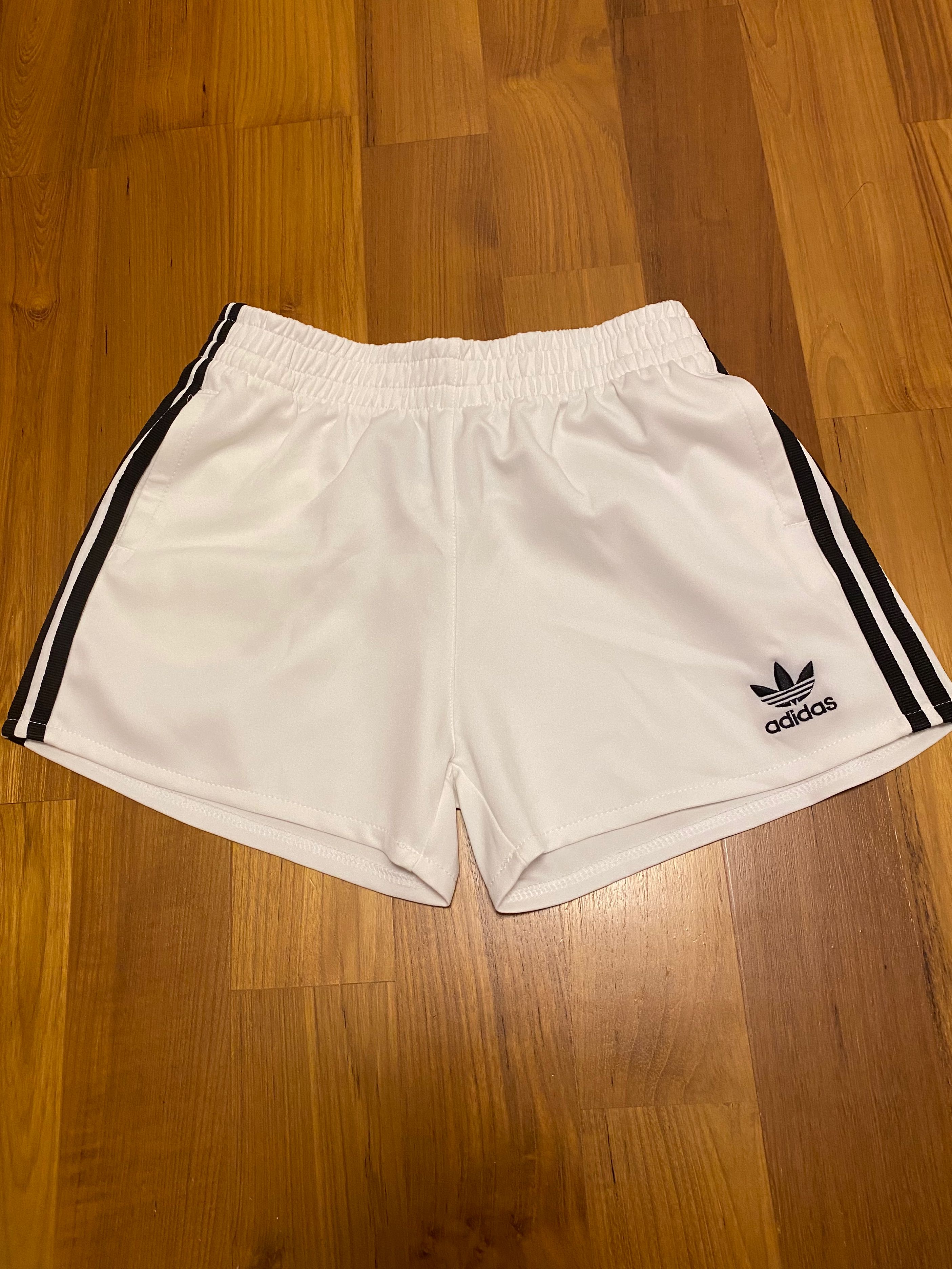 Adidas white shorts, Women's Fashion, Bottoms, Shorts on Carousell