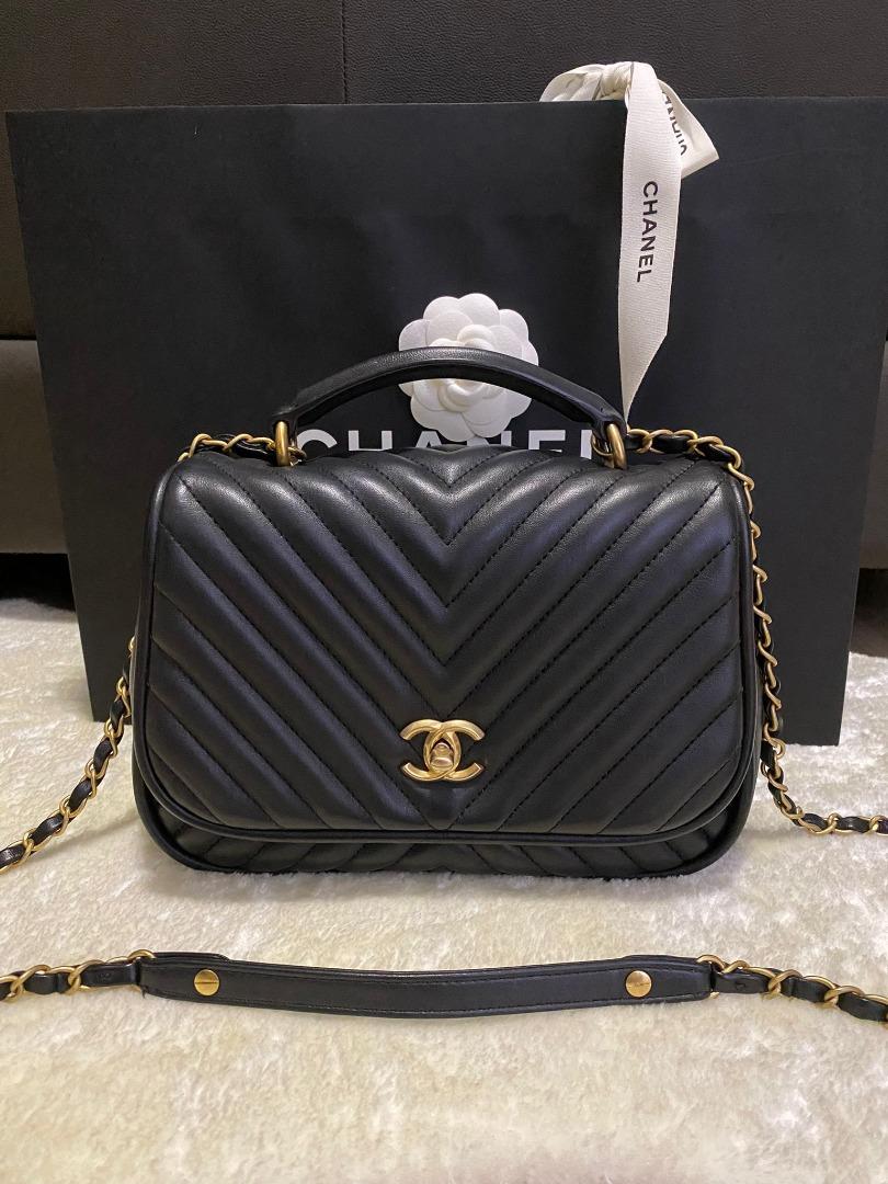 Chanel chevron flap bag with top handle deals