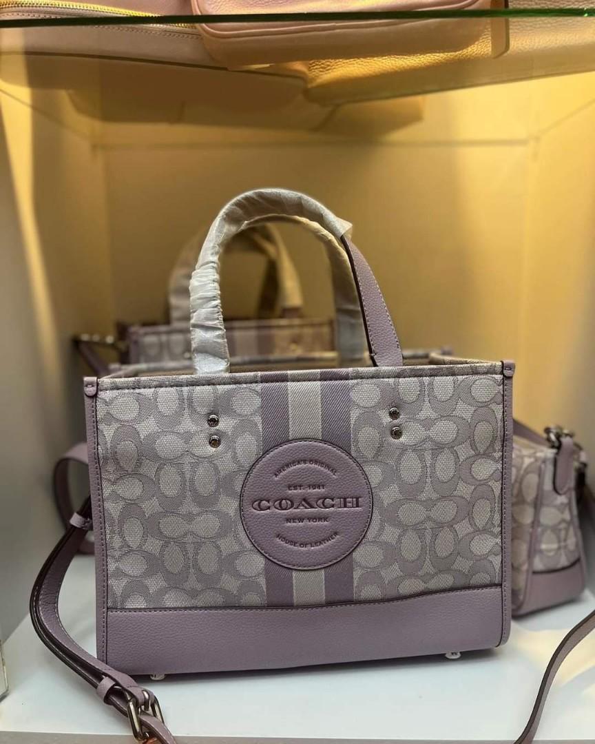 Coach Dempsey Collection in Soft Lilac (Category: Luxury Bags & Wallets) located in Quezon City. Submitted by bagsboutiqueph (Listing ID 1175651048, Image 2). Description: LAST PRICE POSTED. LIMITED STOCKS ONLY. NEW ARRIVAL BRANDNEW WITH INCLUSIONS. OTHER PHOTOS WILL BE SEND DURING PURCHASE AND FOR SURE BUYERS ONLY. WHEN IN DOUBT, DO NOT ORDER. THANK YOU..