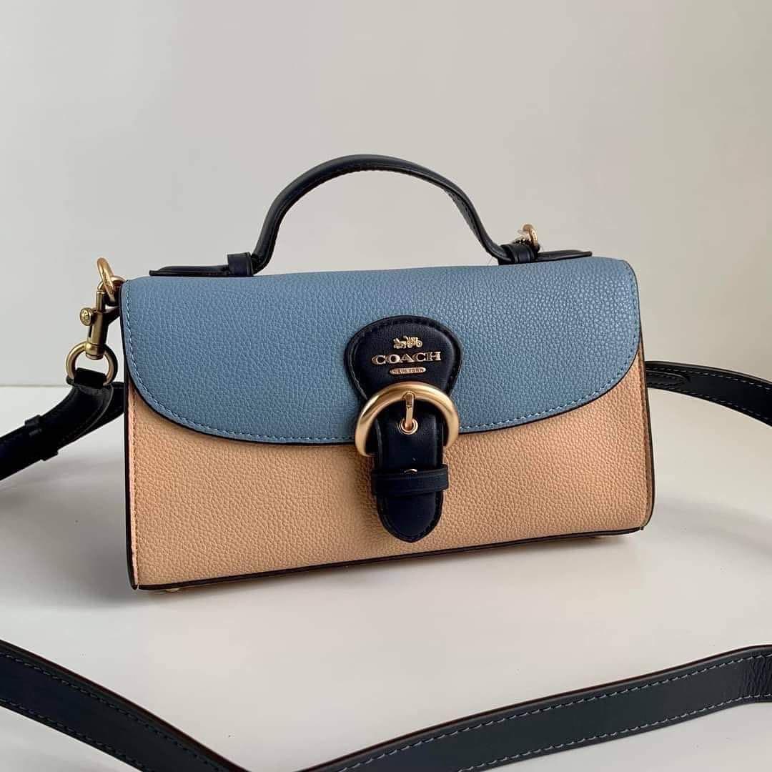 Coach Kleo Top Handle in Colorblock (Category: Luxury Bags & Wallets) located in Cavite. Submitted by LuxbyMarifrance (Listing ID 1175655514, Image 2). Description: 🏷 3,000 only + SF 🛍 Coach Kleo Top Handle in Colorblock 📏 9 1/4″ (L) x 5″ (H) x 3 1/4″ (W) 📌 with paper bag, dust bag and care card 🖍 Marble Blue/Faded Blush Multi * Refined pebble leather and smooth leather * Inside zip and multifunction pockets * Snap closure, fabric lining * T