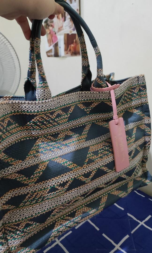 Coccinelle Never Without Bag / Jacquard Tote (Category: Luxury Bags & Wallets) located in Pasig City. Submitted by luxebagcray (Listing ID 1175083704, Image 3). Description: Super chic and roomy jacquard tote a la Dior Book Tote - great for casual style/beach/road trips Size medium - spacious without overwhelming small frames With bag tag and cards RFS: Spring cleaning Used only once! Still retails at 200+ USD so this is a steal.