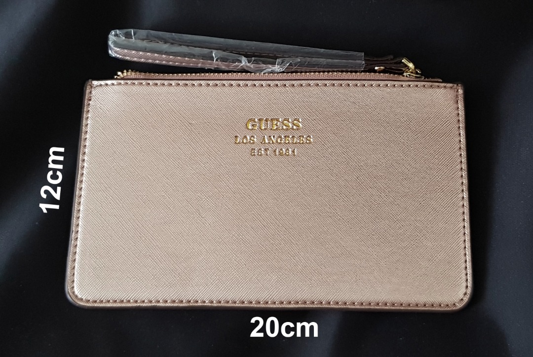 Guess wrist hot sale wallet