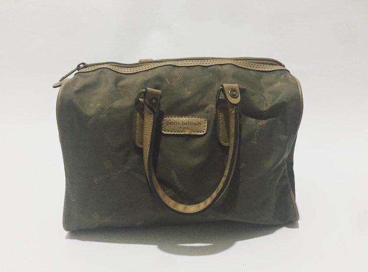 Pierre Balmain Mini Duffle Bag (Category: Luxury Bags & Wallets) located in San Juan City. Submitted by pepitomanaloto_777 (Listing ID 1175823947, Image 1). Description: Pierre Balmain Mini Duffle Bag Condition: 8/10 Price: 1.3k Shipping fee not included..