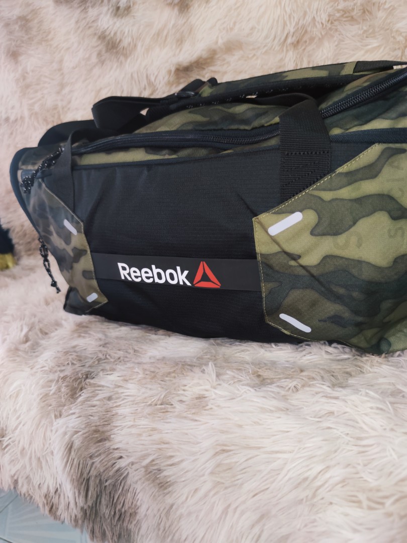 REEBOK TRAVEL BAG preloved, Men's Fashion, Bags, Sling Bags on Carousell