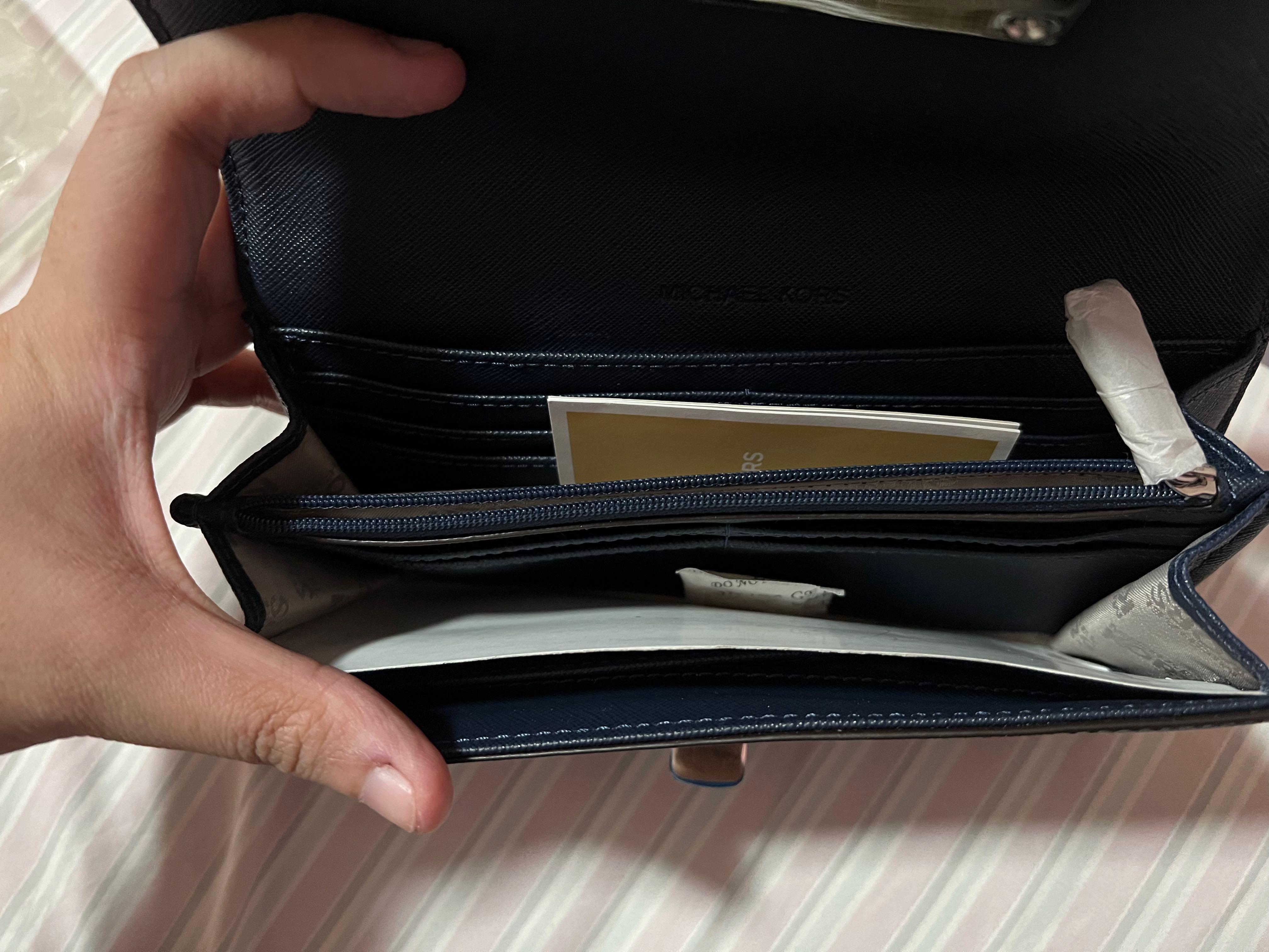 available onhand michael kors mk navy long wallet (Category: Wallets & Card holders) located in Quezon City. Submitted by second___life (Listing ID 1170650231, Image 3). Description: brand new never used some minor scratches on silver hardware lock Michael Kors navy long wallet no box given as a gift rfs: decluttering.