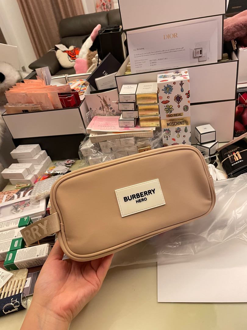 Burberry pouch beauty bag, Luxury, Bags & Wallets on Carousell