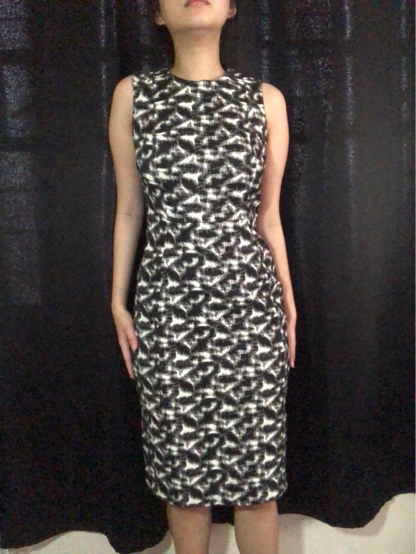 Calvin Klein Office Dress (Category: Dresses) located in Manila. Submitted by dreyuhans (Listing ID 1170477874, Image 1). Description: **About the Product:** Brand: Calvin Klein Issues: None. Extra Information: Beautiful gold zipper at back. Body hugging. Thick fabric material. Bought in London. Measurements: Size 2 on the label. MOP: GCash/Paymaya, BDO/BPI/Tonik/Unionbank Meet-Ups: Marikina/San Juan (P50 convenience fee) Logistics: Fastrack (def