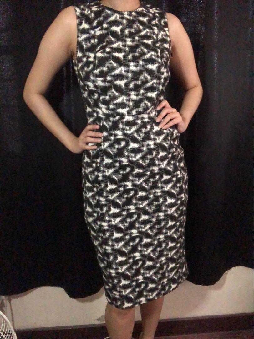 Calvin Klein Office Dress (Category: Dresses) located in Manila. Submitted by dreyuhans (Listing ID 1170477874, Image 3). Description: **About the Product:** Brand: Calvin Klein Issues: None. Extra Information: Beautiful gold zipper at back. Body hugging. Thick fabric material. Bought in London. Measurements: Size 2 on the label. MOP: GCash/Paymaya, BDO/BPI/Tonik/Unionbank Meet-Ups: Marikina/San Juan (P50 convenience fee) Logistics: Fastrack (def