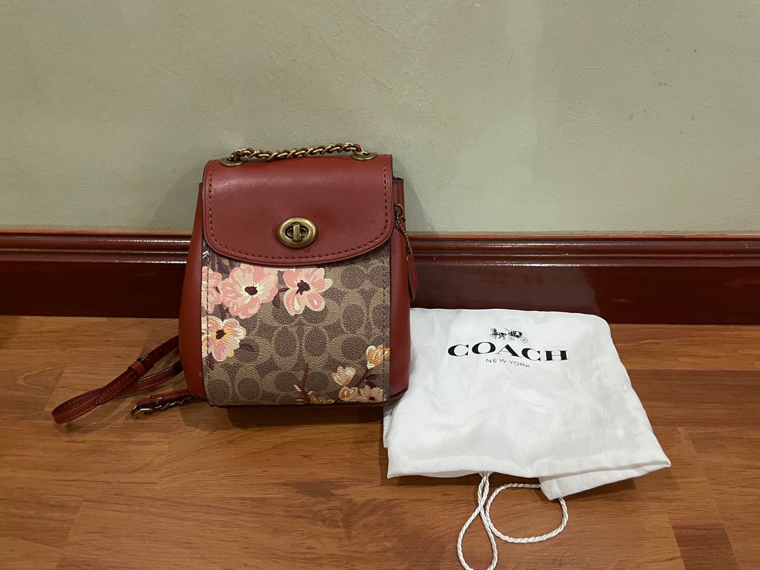 coach sling backpack women's