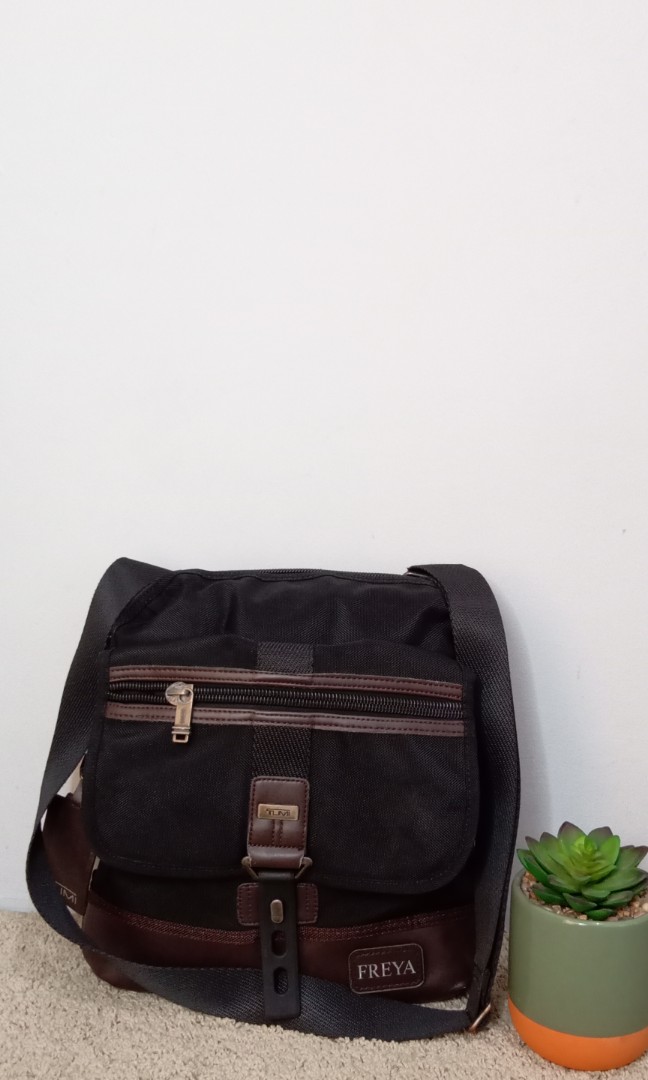 tumi side bag