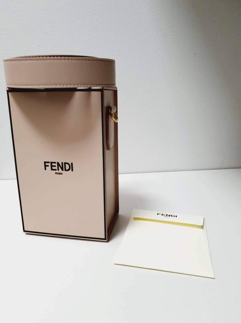 Authentic Fendi Bag (Category: Luxury Bags & Wallets) located in Manila. Submitted by danielatan (Listing ID 1170730893, Image 1). Description: Given as gift, with original cert and paper bag Rigid bag in a vertical design with magnetic clasp, made of wood and covered in pink leather with a black “FENDI ROMA” print. Palladium-finish metalware. The shoulder strap is adjustable and allows the bag to be worn over the shoulder or cross-body. Made in 