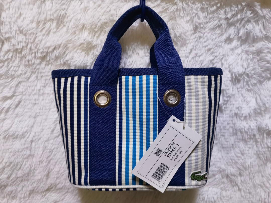 Lacoste Deep Blue Stripe Handbag Small (Category: Luxury Bags & Wallets) located in Pateros City. Submitted by chichachanceonestopshoppe (Listing ID 1170729295, Image 2). Description: Bought from SG.