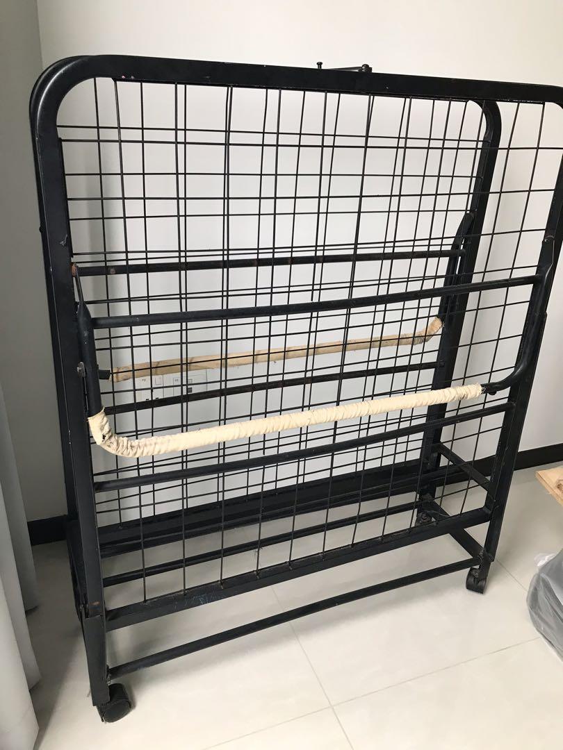 Metal folding bed frame on wheel, Furniture & Home Living, Furniture
