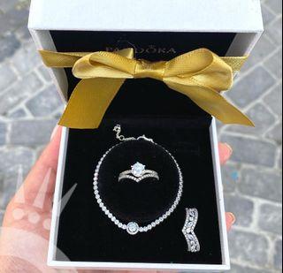 Pandora silver set of bracelet and 3 rings