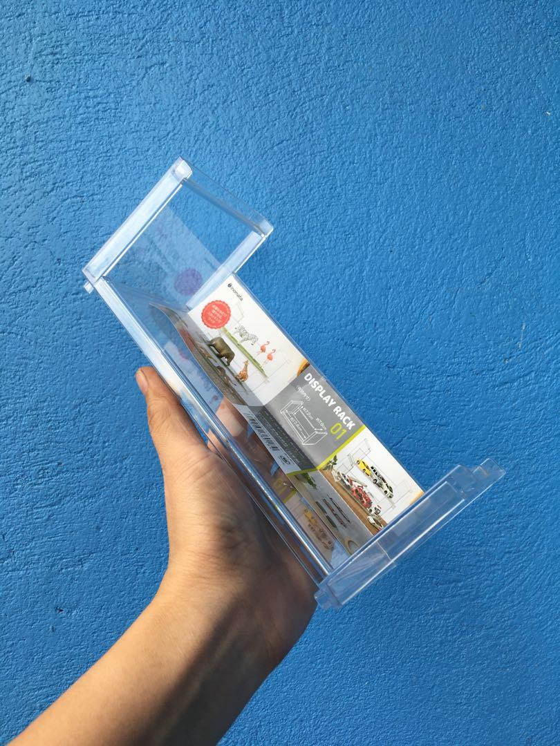 CLEAR ACRYLIC DISPLAY RACK (Category: Storage Boxes & Baskets) located in Mabalacat. Submitted by whowannashoppe (Listing ID 1170953153, Image 3). Description: ACRYLIC DISPLAY RACK (17.4 cm x 7.2 cm x 7.8 cm) Stocks: 3 pcs available ✔️ new ✔️ stackable ✔️ ideal for your mini collectible figures.