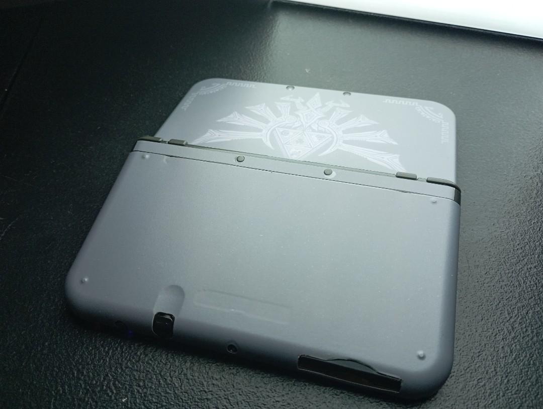 New Nintendo 3DS XL Hyrule Edition with Pokemon Moon Gamecart (DUAL IPS