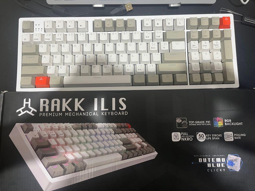 RAKK ILLIS (Category: Computer Keyboard) located in Manila. Submitted by tachipedia (Listing ID 1170922731, Image 2). Description: Rakk Illis 1500 Hot Swappable RGB Blue Switches With Original Keycaps and Extra Keycaps With White Side Cover With Box ALSO UP FOR TRADE.