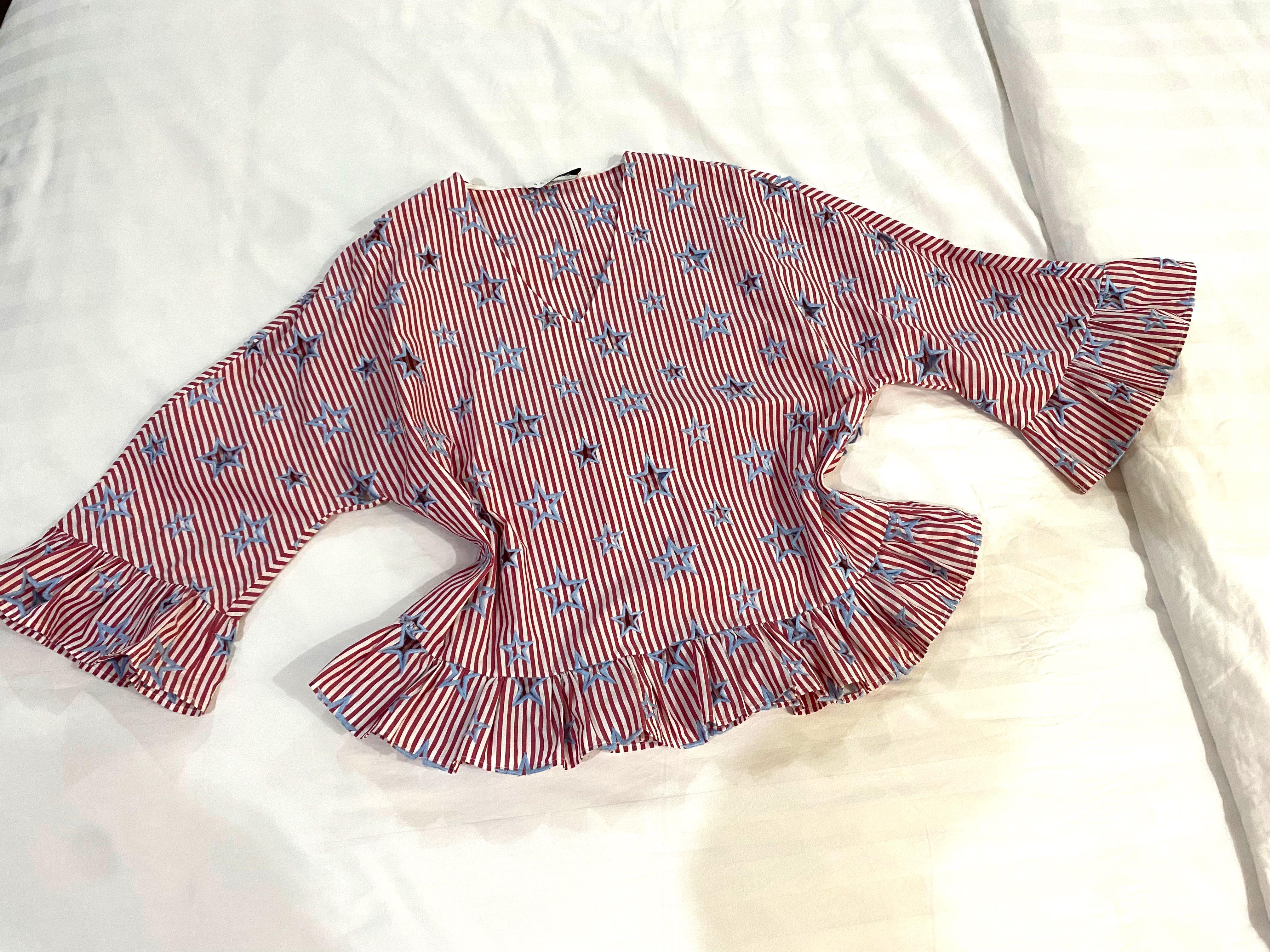 Sandro pinstripes blouse with stars as designs (Category: Blouses) located in Manila. Submitted by cathycart (Listing ID 1110549158, Image 2). Description: Sandro Paris top, red and light blue pinstripes , with stars, almost new! Fits small to large framea.