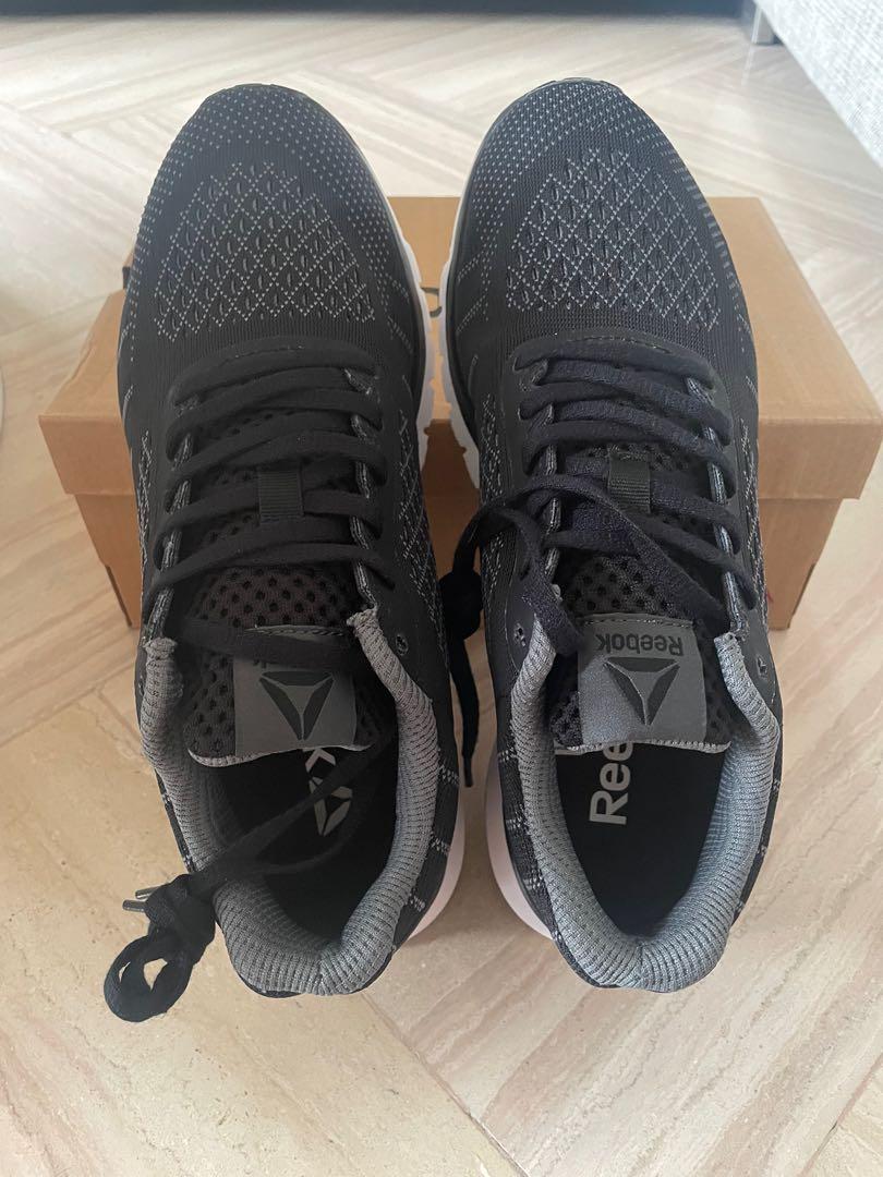 Reebok black sports shoes online