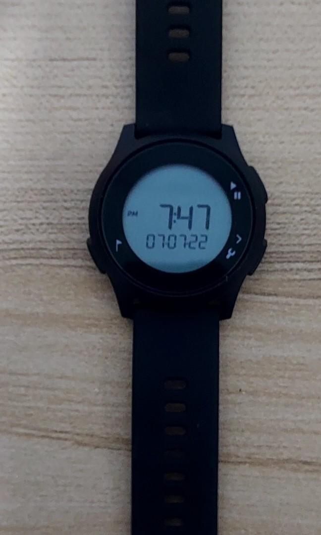 Black coloured watch. From Decathlon. Waterproof. Stopwatch feature. Can put laps. Shows date. Shows Pm or Am. Shows Date Year Month