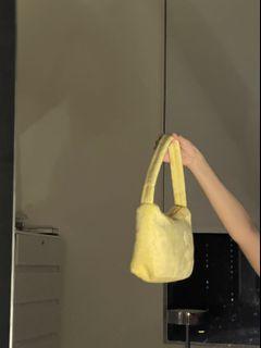 Cute yellow fur bag