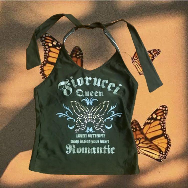 Fiorucci army green halter rhinestone top (Category: Sleeveless) located in Quezon City. Submitted by b3lbryn (Listing ID 1171156631, Image 1). Description: Authentic Fiorucci top. Never used. Glittery rhinestone top with a stretchy material. Message for more details! Shopee checkout available .