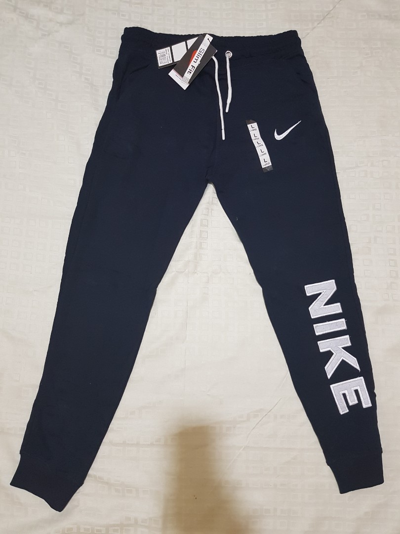 Nike Joggers Navy Blue, Men's Fashion, Bottoms, Joggers on Carousell