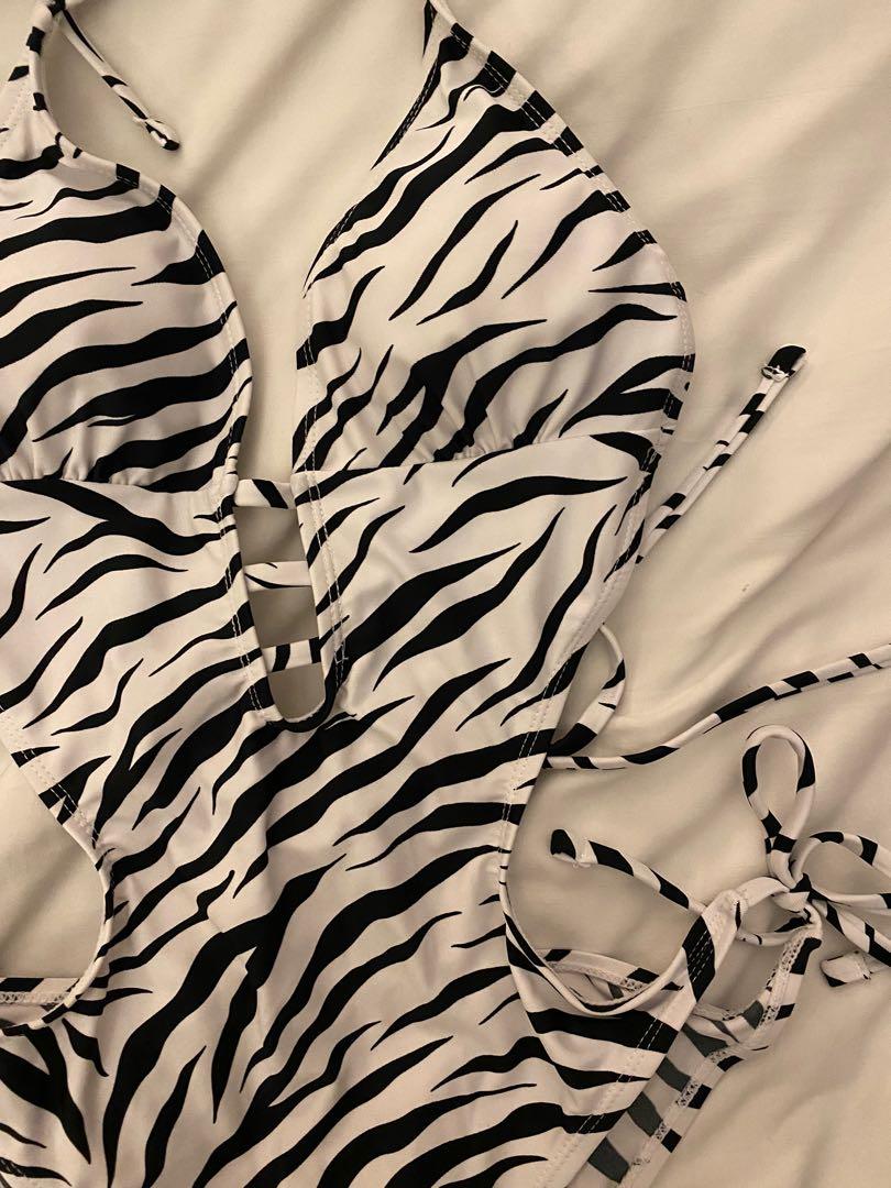 Shein Zebra One Piece (Category: Bikinis & Swimsuits) located in Cebu City. Submitted by vanmags (Listing ID 1171129369, Image 3). Description: Good as brand new No flaws Stretchable Can fit up to Semi Large With surprise freebie if 5 items and up Rfs: decluttering .